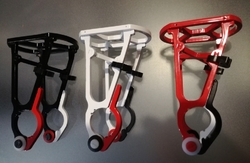 Standard colors of the base - black, red, white. It is possible to have different color of both clamps/one clamp as you can see here. Please specify in a comment.
